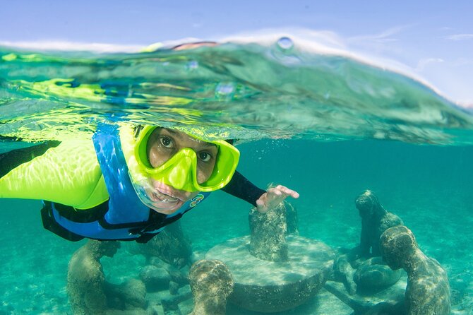 2-Hour Snorkeling Paradise Reef in Cancún Underwater Museum - The platform break: shade, drinks, and a slower pace