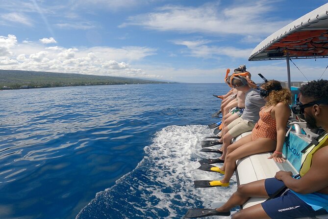 4 Hour Big Island Dolphin Watch Boat Tour, Snorkeling & BBQ Lunch - Relaxing on KIBOU after the water time