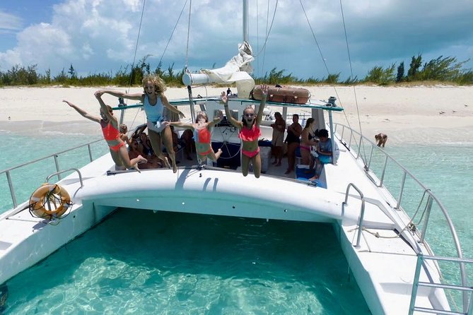 4-Hour Catamaran Sail and Snorkel Tour from Grace Bay - Setting sail from Grace Bay Beach