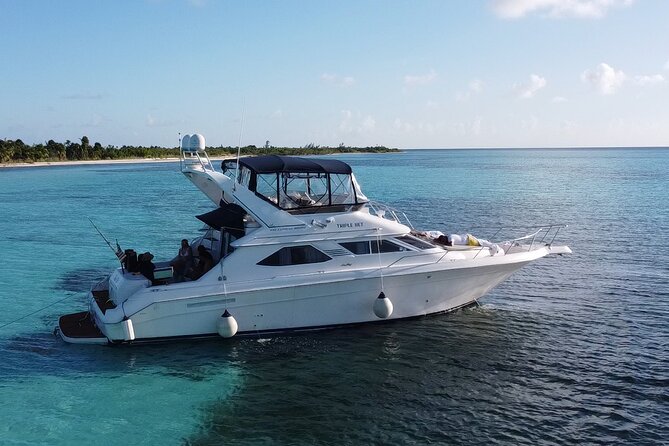 4 hours snorkel & beach tour - Private Yacht 47 ft - Snorkeling, paddleboarding, and fishing from the yacht