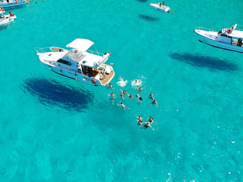5 hours Lampedusa: Boat Tour with panino SUP e snorkeling - Stand-up paddleboarding without extra planning