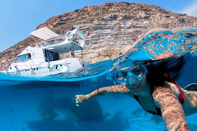 7 hours Boat trip to Lampedusa lunch, SUP and Snorkeling - Key points at a glance