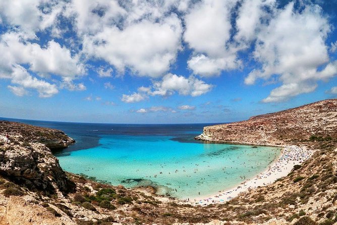 7 hours Boat trip to Lampedusa lunch, SUP and Snorkeling - Swimming, snorkeling, and SUP between the stops