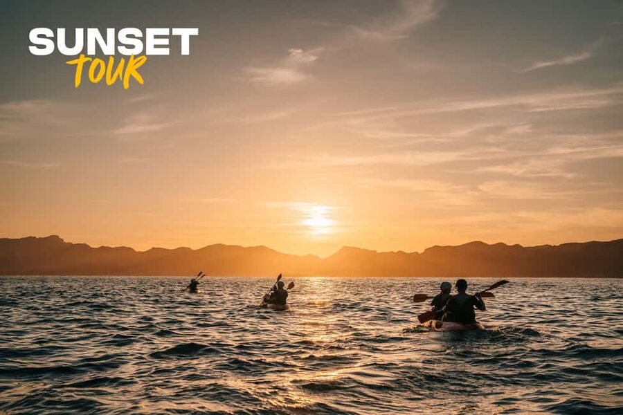 Alcudia: Kayak Tour with Snorkel & Sea Cave Swim - Paddling beside La Victòria