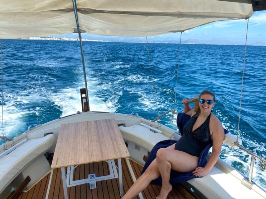 Alcudia: Traditional Wooden Boat Trip with Snorkeling - Aucanada Lighthouse and the second water stop