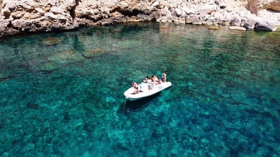 Alghero: Snorkeling Boat Tour in Porto Conte and Capo Caccia - Carlo’s Role and the Small-Group Atmosphere