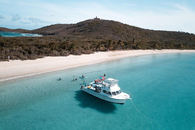 All Inclusive Beach and Snorkel Boat Tour to Icacos Island - The Tortuga crew sets the tone