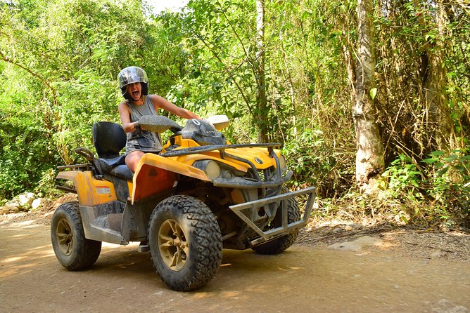 ATV Extreme and Snorkel Combo Tour from Cancun - Riding an ATV through the jungle