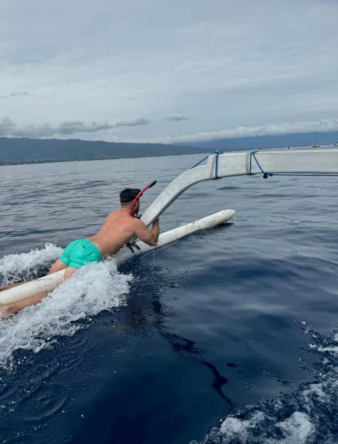 Bali: Lovina Sunset Tour with Snorkeling Experience - Snorkeling among coral, fish, and starfish