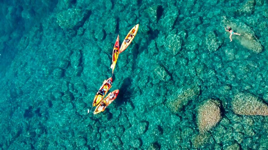 Barcelona: Costa Brava Kayak, Snorkel & Cliff Jump & Lunch - Kayaking Along Cliffs, Caves, and Small Beaches