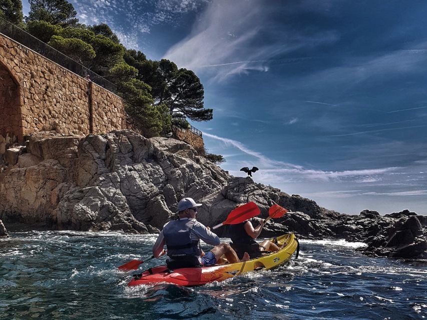 Barcelona: Costa Brava Tour with Kayak & Lagoon Snorkeling - Kayaking through coves and sandstone cliffs