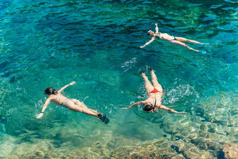 Barcelona: Tossa de Mar Kayak & Snorkel Tour w/3-Course Meal - Three hours among caves, cliffs, and coves