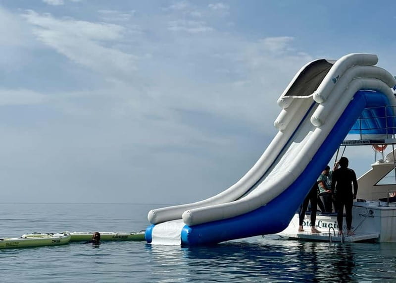 Benalmádena Boat Tour with Snorkeling, Water Slide and Lunch - Who will enjoy this Benalmádena boat trip?