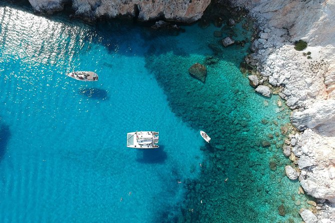 Best of Milos and Poliegos Catamaran snorkelling Cruise with BBQ - Kalogries, the big cave, and Cape Vani
