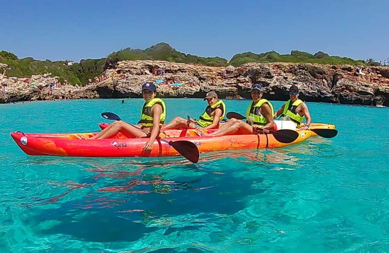 Binibèquer: Kayaking, Caves and Snorkeling Adventure - Entering sa Cova d’es Pont and the smaller caves