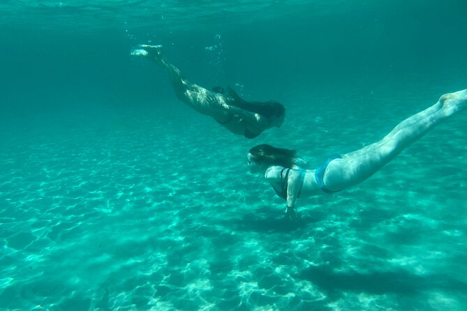 Boat Tour at Devil's Saddle: 4 Swim Stops, Snorkeling & Prosecco - Leaving Molo Dogana for Devil’s Saddle