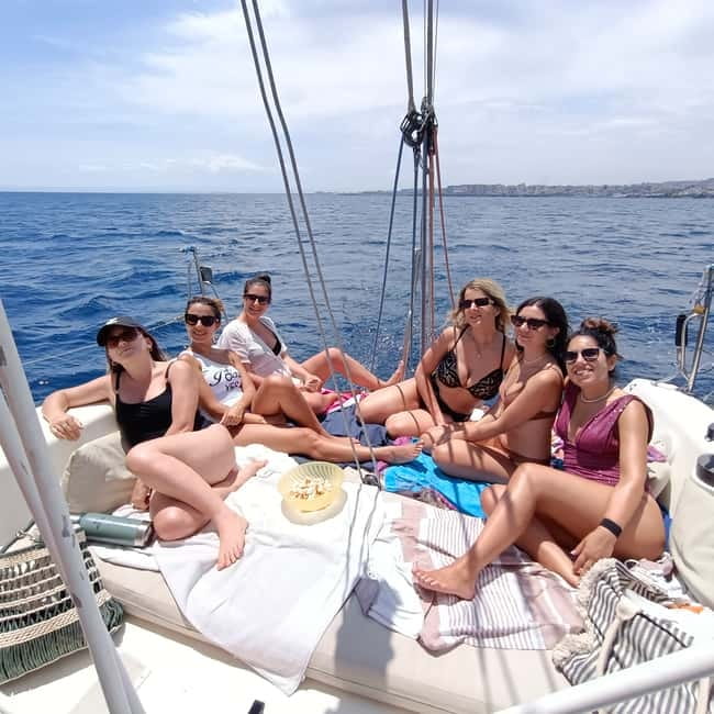 Boat trip to the Cyclades with Prosecco and snorkeling - Aci Castello and the Cyclops Islands