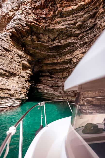 Budva Bay: Boat Tour with Snorkeling and Sightseeing - Swimming through caves and shallow water
