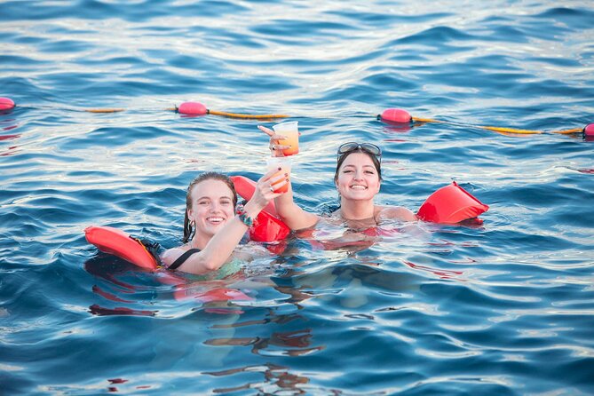 Cabo San Lucas Boat Tour with Snorkeling, Open Bar, and Lunch - Lunch, music, games, and the ride home