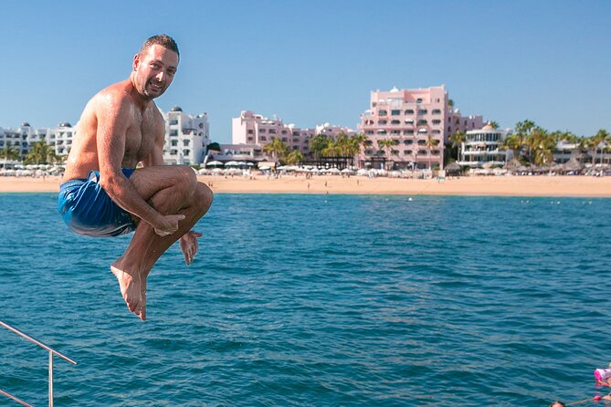 Cabo San Lucas Boat Tour with Snorkeling, Open Bar, and Lunch - Boarding at Cabo Marina at noon