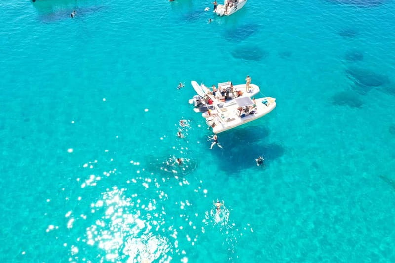 Cagliari: Boat Tour, 4 Stops, Swim, Snorkeling, & 1 Spritz - Speeding toward the Cagliari Cruise Port
