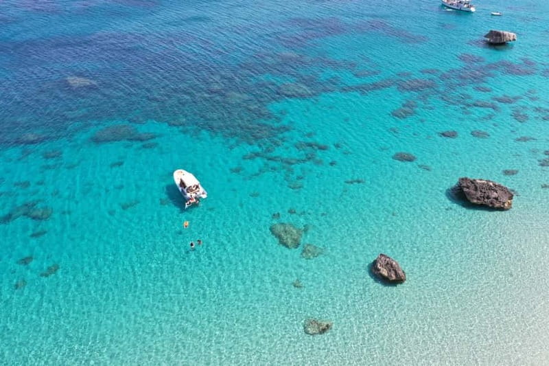 Cagliari: Boat Tour, 4 Stops, Swim, Snorkeling, & 1 Spritz - Meeting at Bacan and getting onto the RIB