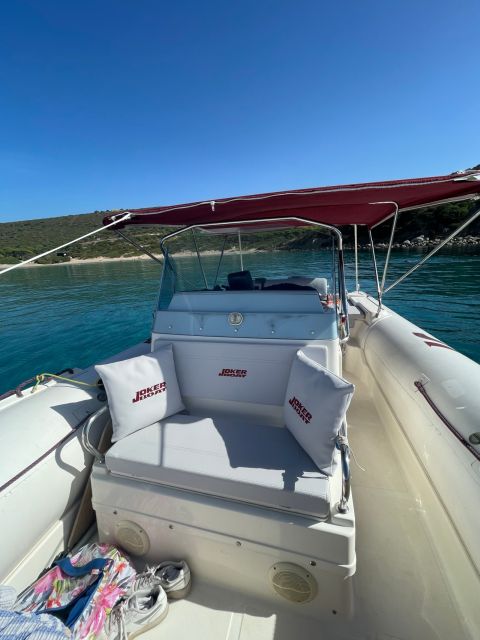 Cagliari: Boat Tour snorkeling Sella con con aperitivo - Cala Fighera: more swimming in a scenic cove