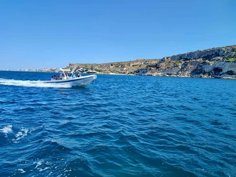 Cagliari: Boat Tour with Snorkeling, GoPro & Sardinian Beer - A final snorkeling stop for fish and sea life