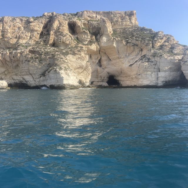 Cagliari: Boat Tour with Swim Stops, Snorkeling, & Aperitif - Cala Mosca and a pause for local food