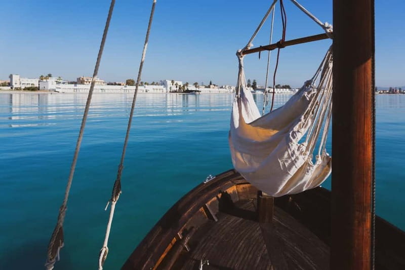 Cagliari: Gozzo Tour with 3 Swim Stops, Snorkel & Local Food - Cala Mosca offers the first proper swim