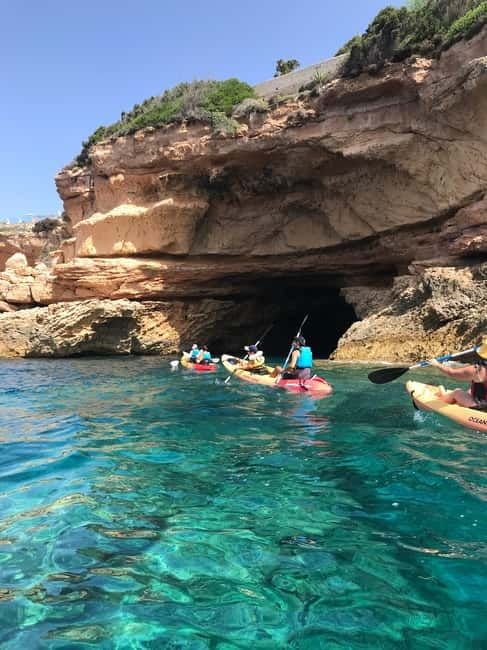 Cala Codolar: Sea & Caves Kayaking Tour with Snorkeling - Paddling Past Cliffs, Coves, and Sea Caves