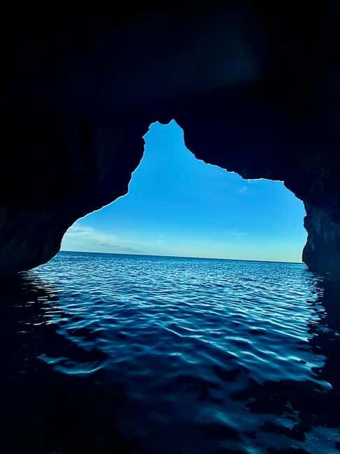 Can Picafort: 2-Hour Boat Tour with Snorkeling & Sea Caves - What the captain adds to the experience