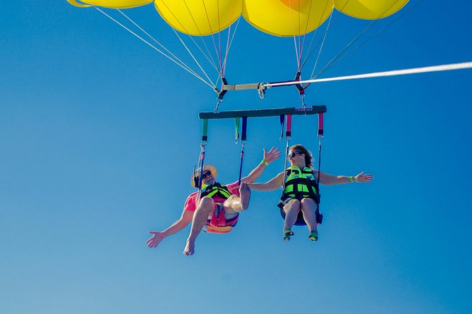 Cancun Adventure: Reef Snorkeling & Parasailing Experience - Finding turtles in shallow Caribbean water