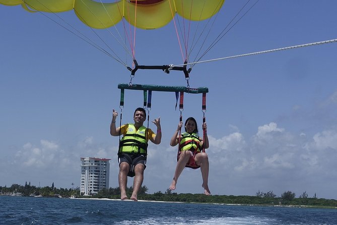 Cancun Adventure: Reef Snorkeling & Parasailing Experience - The wait between activities and photo costs