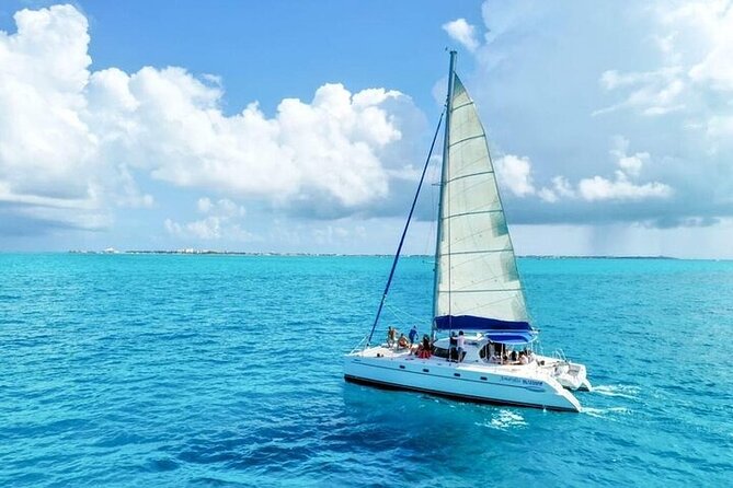 Cancun's Best: Catamaran to Isla Mujeres, Snorkeling & Drinks! - Snorkeling in Caribbean water