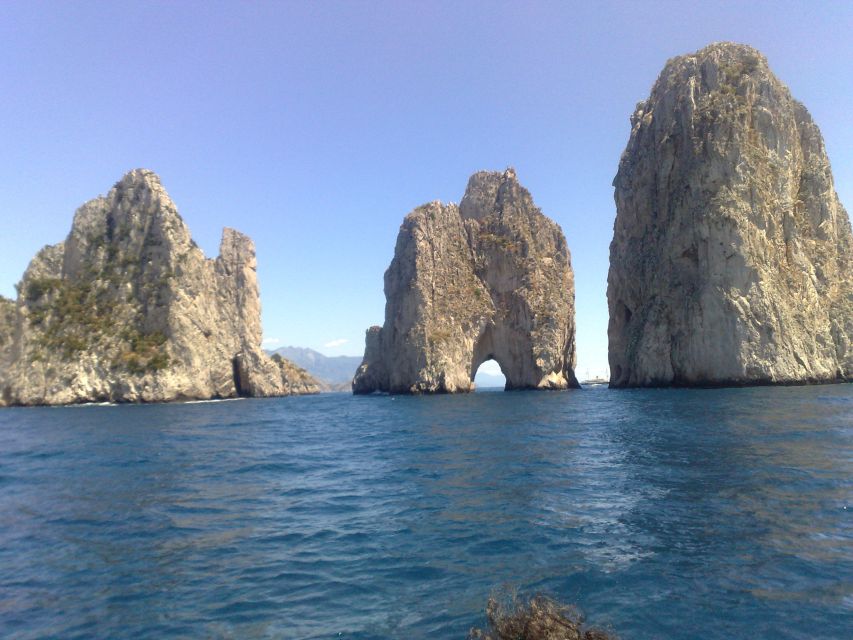 Capri: Private Island Boat Tour with Snorkeling and Swimming - The Green, White, and Red Grottoes