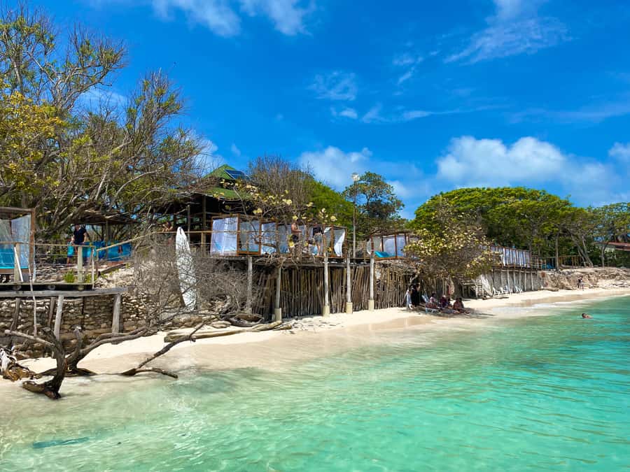 Cartagena: 5-Island Trip by Boat with Lunch and Snorkeling - Cholon: Cartagena’s loudest island stop