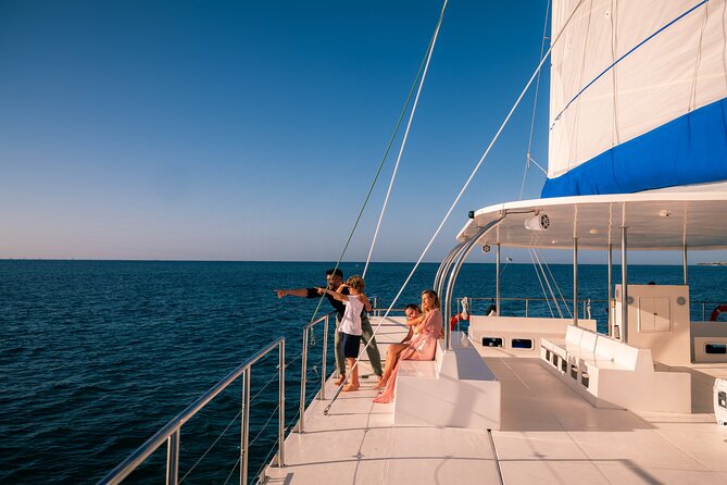 Catamaran Cruise in Riviera Maya With Snorkeling & Beach Club - Transportation, Check-In, and Extra Charges