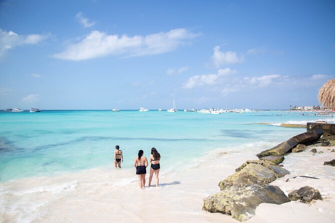 Catamaran Sailing to Isla Mujeres with Snorkeling, Lunch & Open Bar included - Spinnaker riding and the open bar