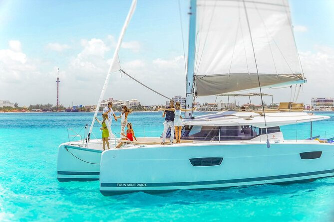 Catamaran to Isla Mujeres Snorkeling Tour with Open Bar and Lunch - Spinnaker rides and the open bar