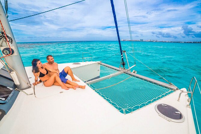 Catamaran to Isla Mujeres Snorkeling Tour with Open Bar and Lunch - Seeing Isla Mujeres town in a short window