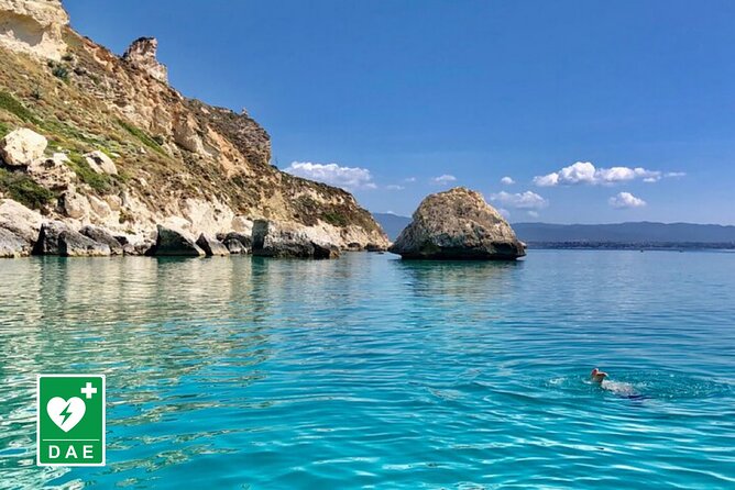 Catamaran tour stops bathing and snorkeling toast with prosecco - What this Cagliari boat trip is really like
