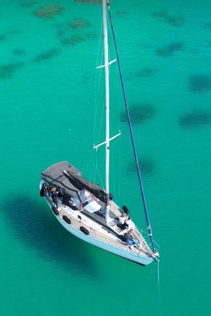 Catamaran tour, swimming, snorkeling, and a Prosecco toast - Cala Mosca and Cala Fighera bring the clearest water moments