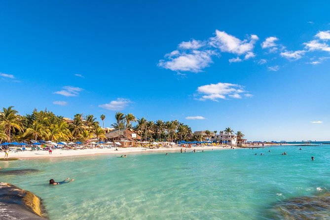 Catamaran Tour to Isla Mujeres, Open bar, Lunch, Snorkeling, Beach Club Included - Free time on Isla Mujeres without a guide