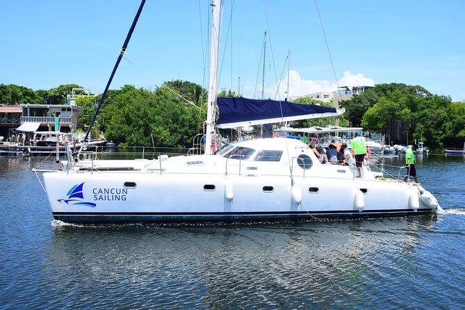 Catamaran Tour to Isla Mujeres, Open bar, Lunch, Snorkeling, Beach Club Included - Who should book this catamaran trip?