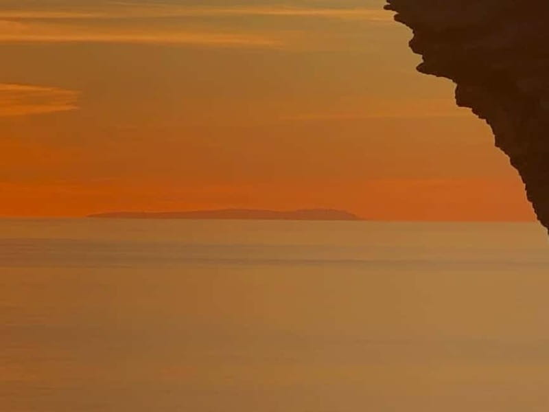 Catamaran trip to the Lavezzi Islands at sunset with snorkeling - Starting from Piantarella Beach or Bonifacio