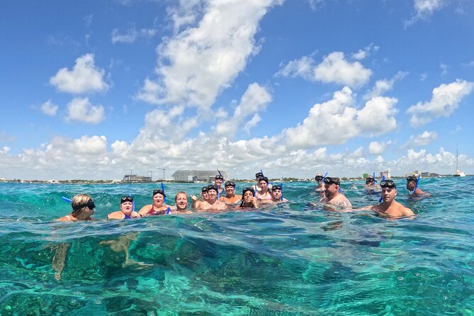 Catamaran with Snorkeling and North Beach, Isla Mujeres - The return sail: drinks, music, and a family atmosphere