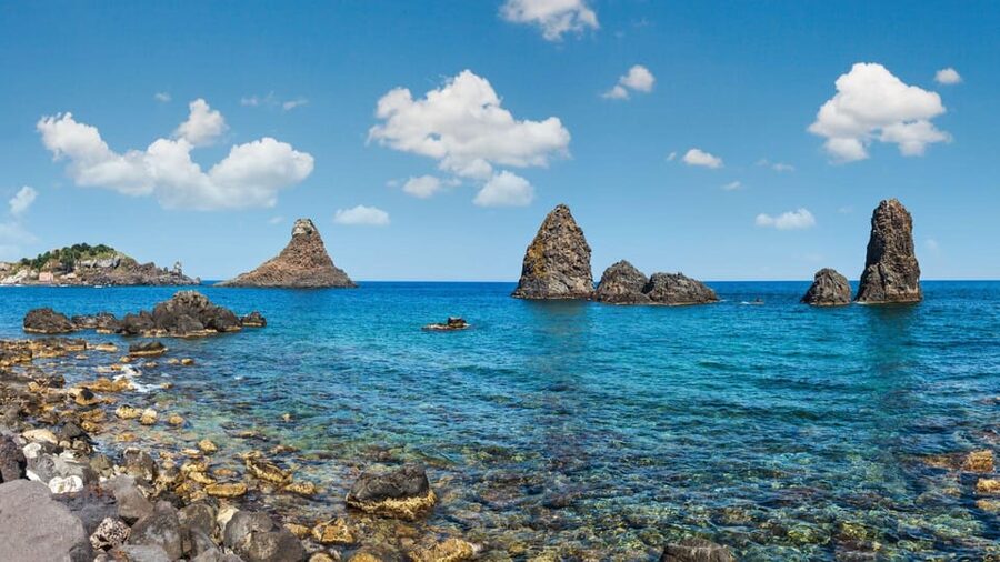Catania: Boat Trip with Aperitif, Prosecco and Snorkeling - Aci Trezza, volcanic stacks, and open water
