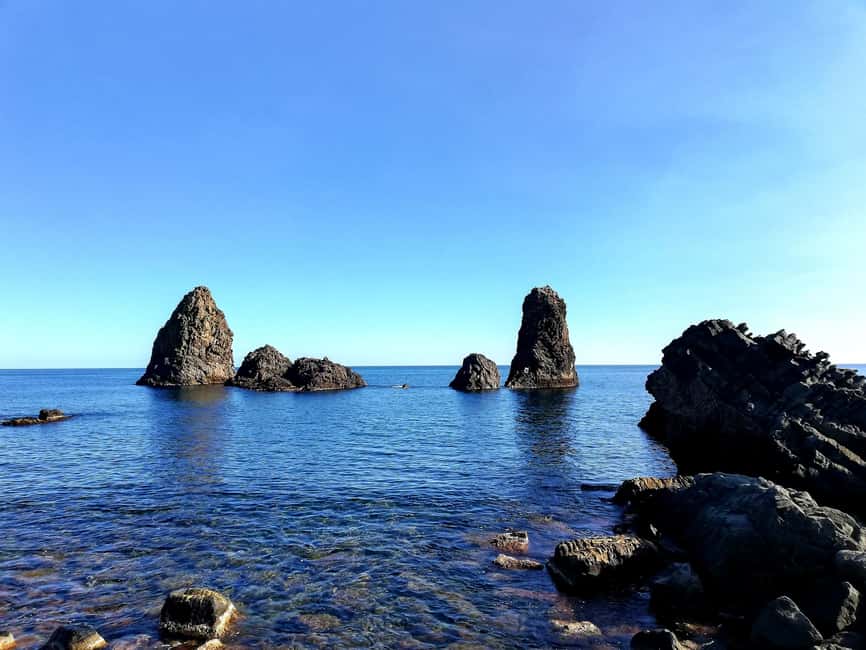 Catania: Cyclops Coast Cruise with Appetizer & Snorkeling - Swimming around the Cyclopean Isles