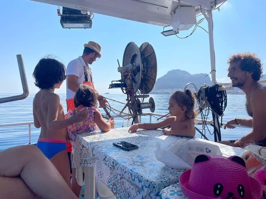 Cefalù: boat trip with fishing, coastal tour, snorkeling, and lunch on board - What the Price Delivers